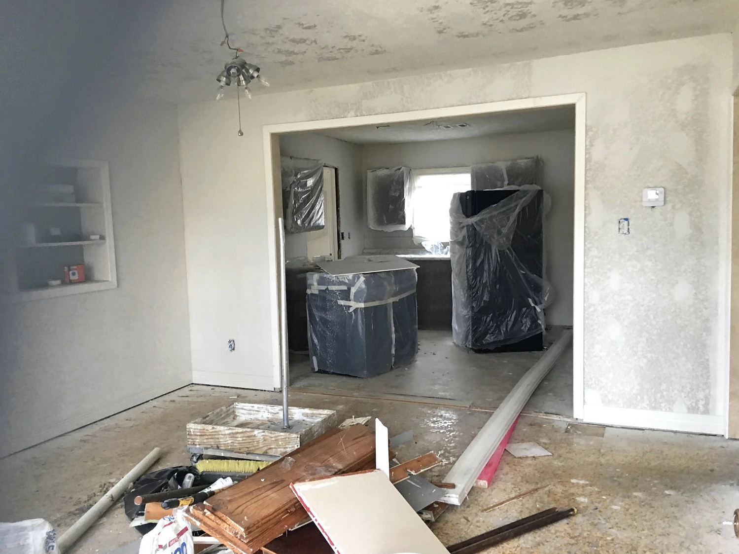 Residential living and kitchen area during renovation