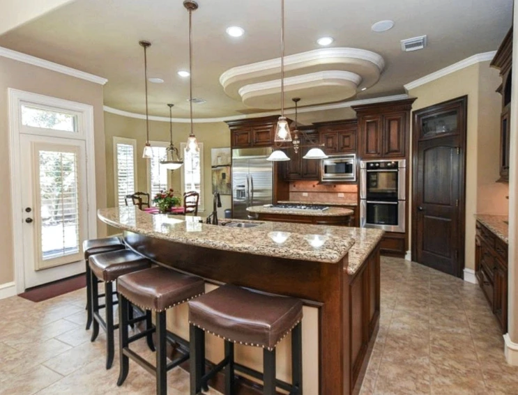 Dark wood kitchen before white kitchen renovation